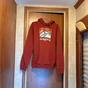 Patagonia Brick Red Hoodie with Mountain Design